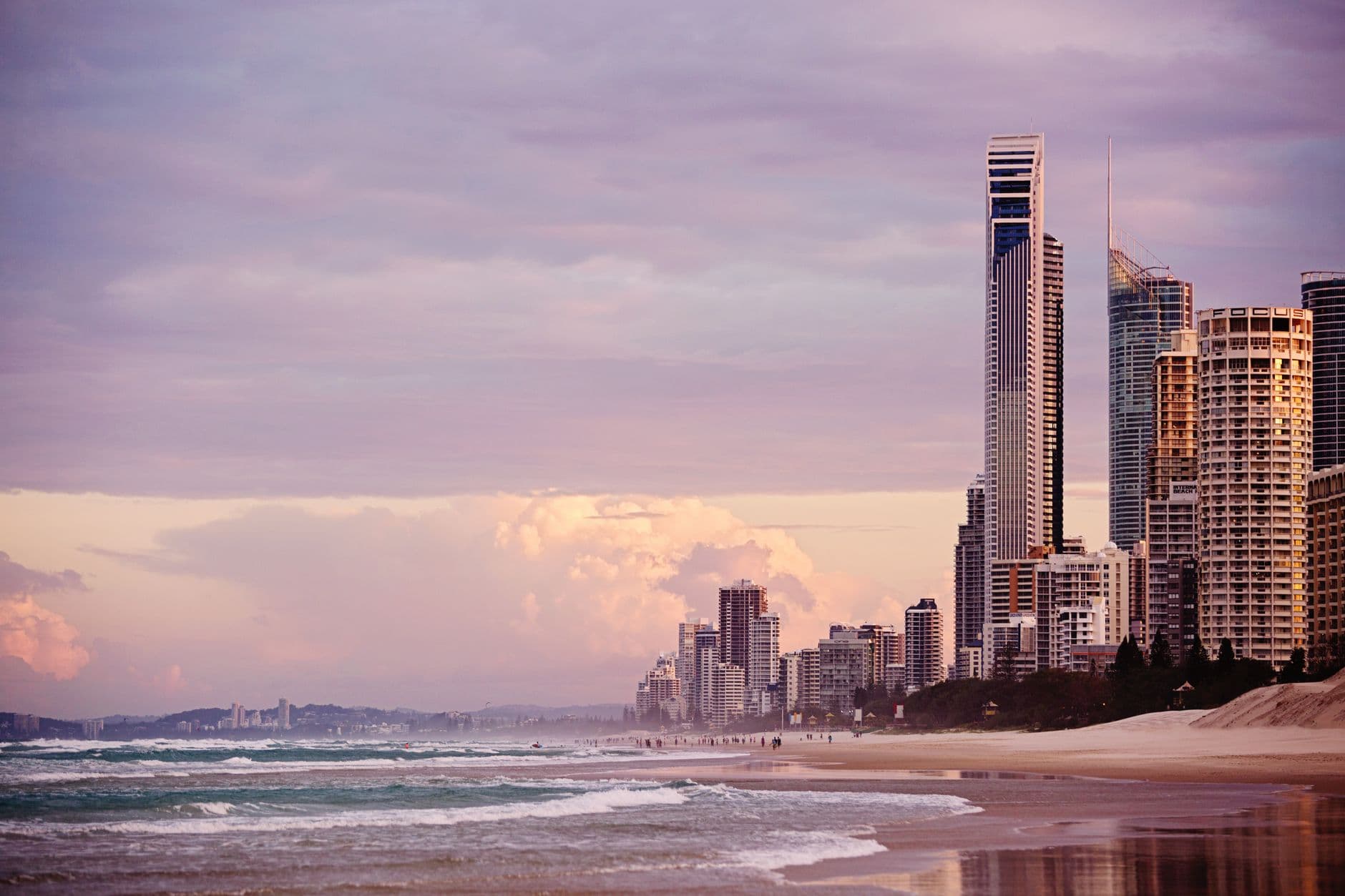 Surfers Paradise towers lining the beach at dusk