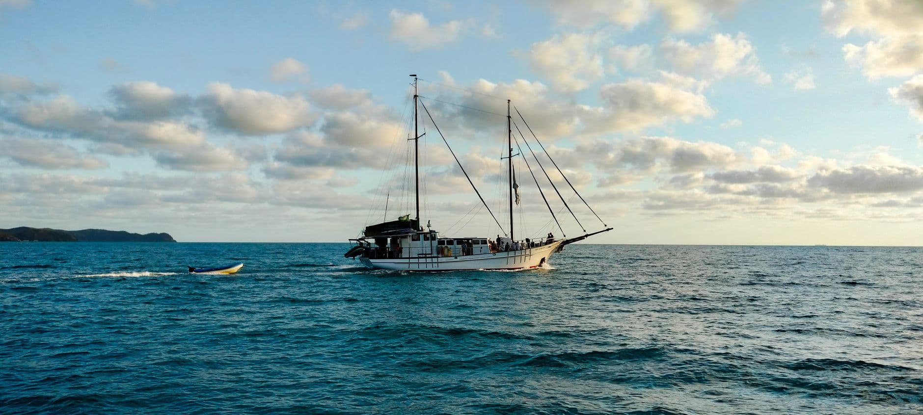 Sailing vessel crossing open water in the Whitsundays